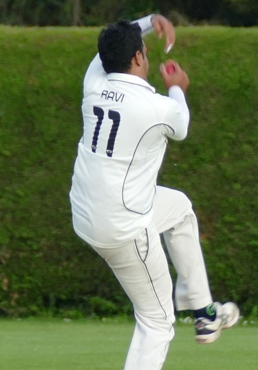 Ravi Kella bowling against Kempsford at Queens in 2011